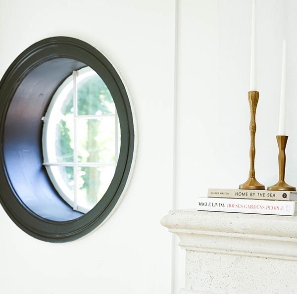 A window and shelf with book